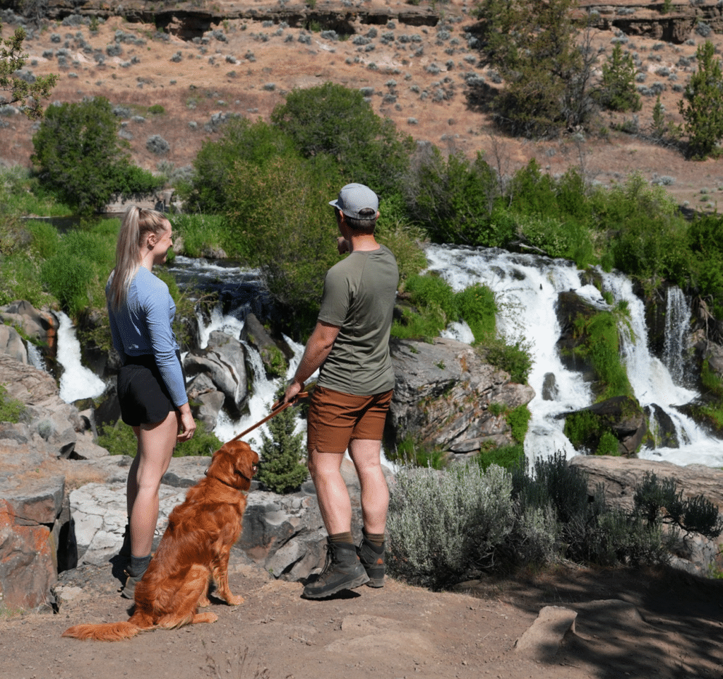 Hikers and dog at a waterfall near Redmond